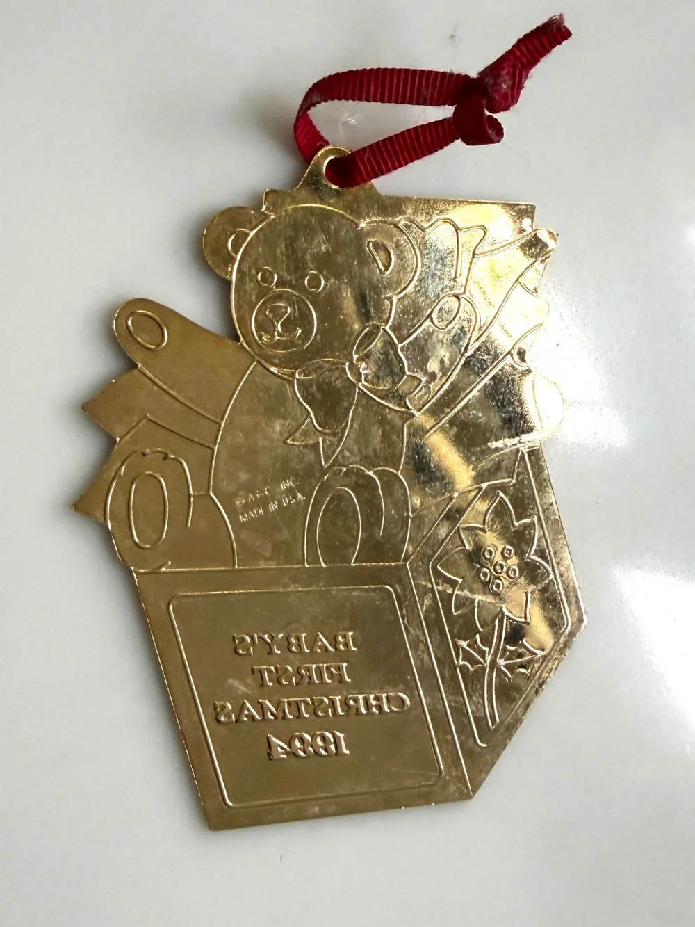 Vintage 1994 Baby First Christmas Bear Present Brass Metal Ornament made in USA